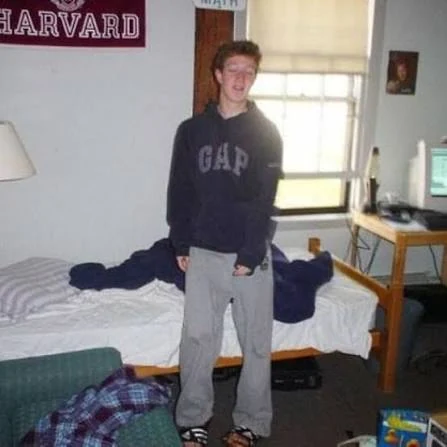 Mark Zuckerberg standing in his Harvard dorm room